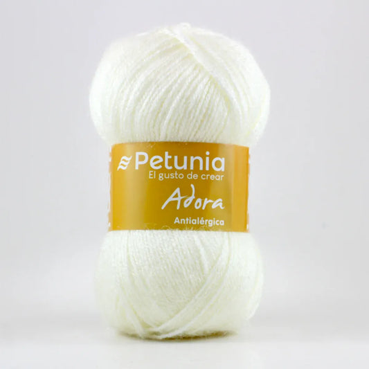 Ovillo de lana Petunia Adora blanco antialergica, 100g, mezcla de acrilico y nylon, ideal para tejer prendas suaves.
