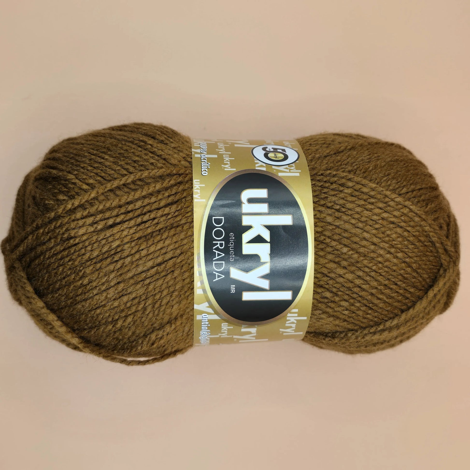 Lana Ukryl Dorada de La Madeja.  Color marrón, suave y de alta calidad. - La Madeja