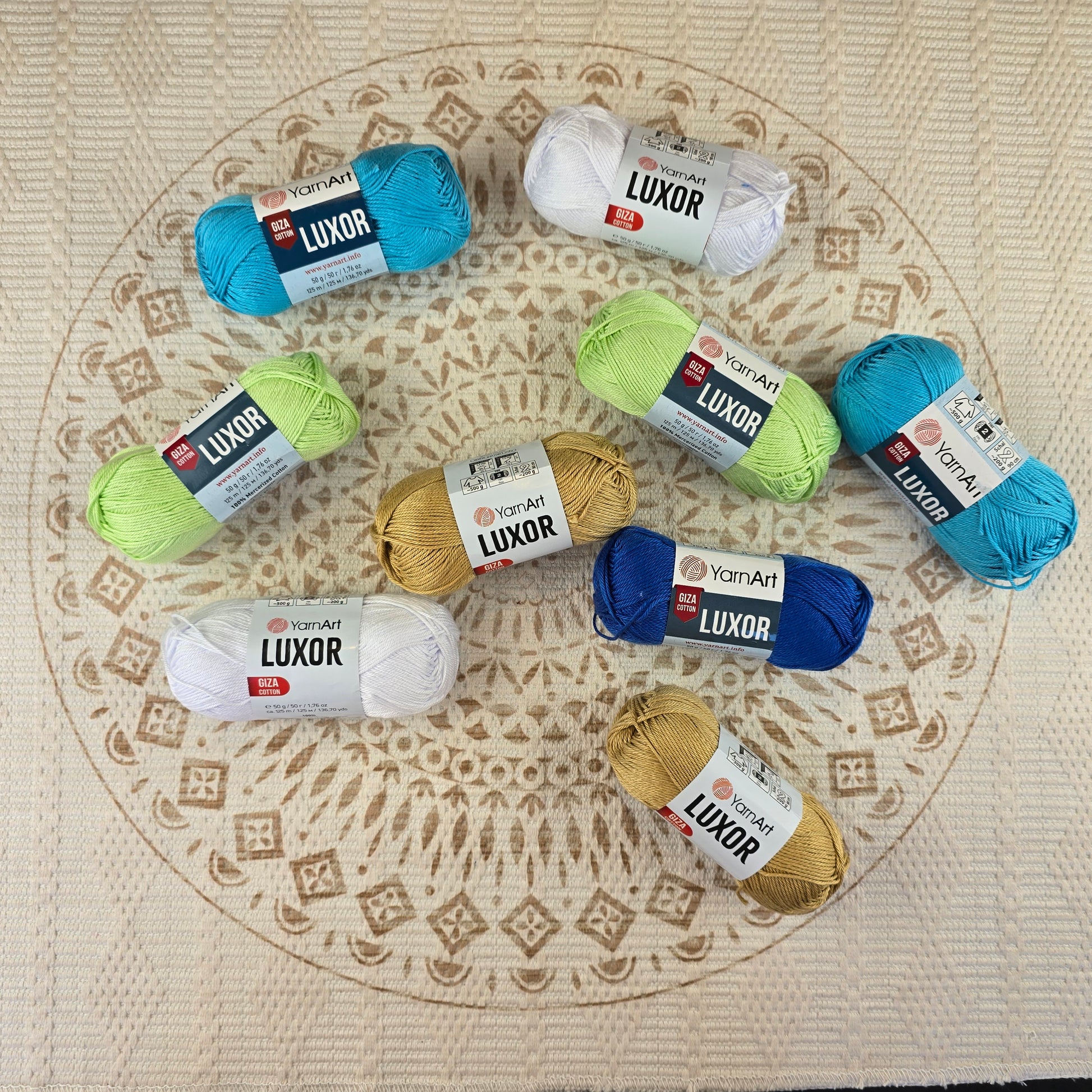 Ovillos de hilo YarnArt Luxor Giza Cotton 100% algodón mercerizado en varios colores: blanco, turquesa celeste, verde pistacho, azul rey y dorado beige.