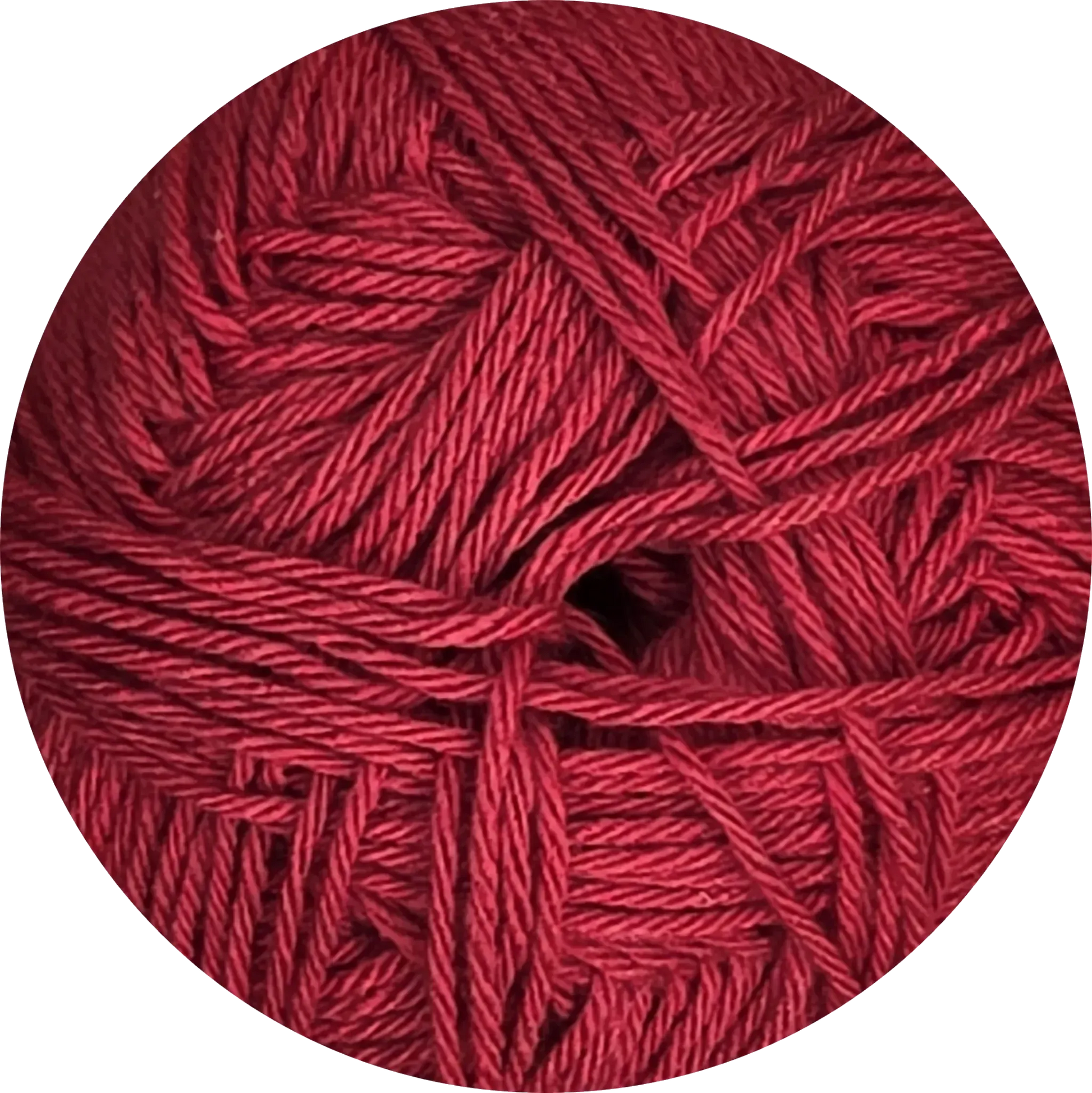 Ovillo de hilo rojo vibrante de microfibra premium Ukryl, ideal para bebés por su textura ultra suave y delicada.