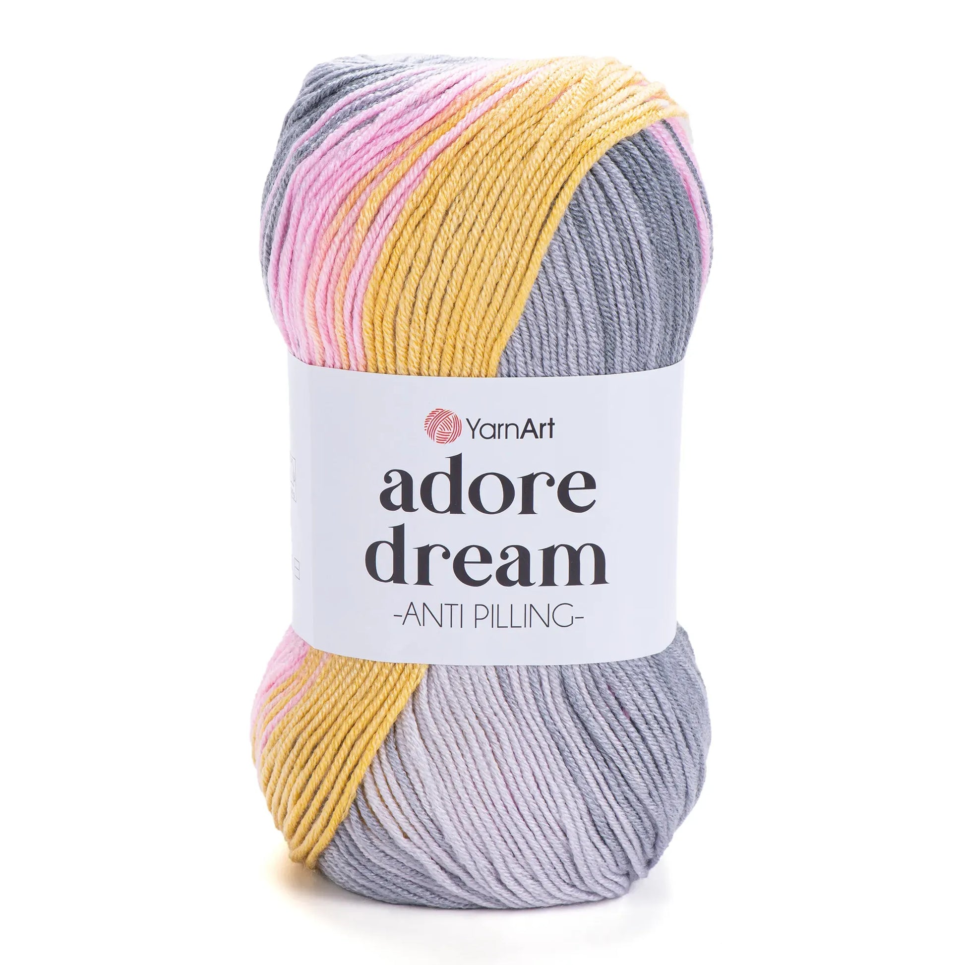 Ovillo de lana YarnArt Adore Dream multicolor en tonos rosa, amarillo y gris, 100% acrílico anti-pilling sobre fondo blanco.