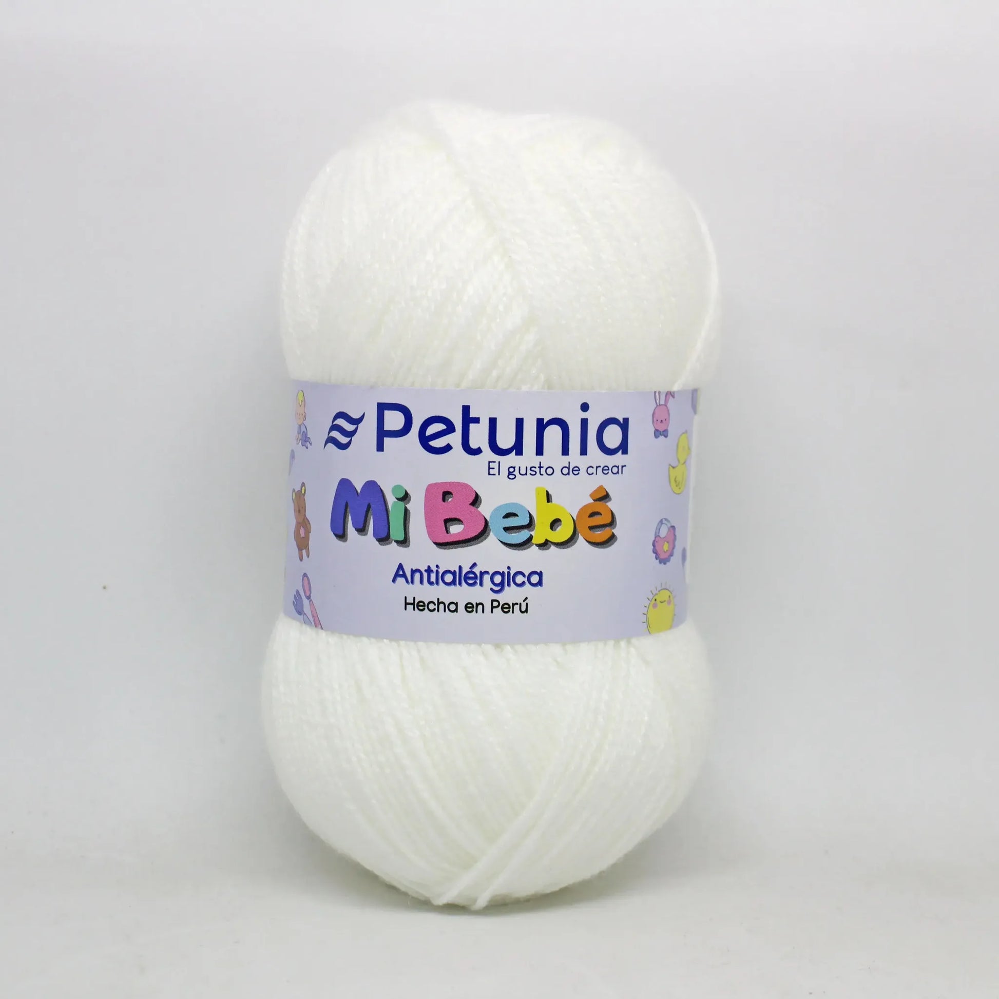 Ovillo de lana Petunia Mi Bebé blanco puro, 100% acrílico antialérgico, ideal para tejidos suaves de bebés.