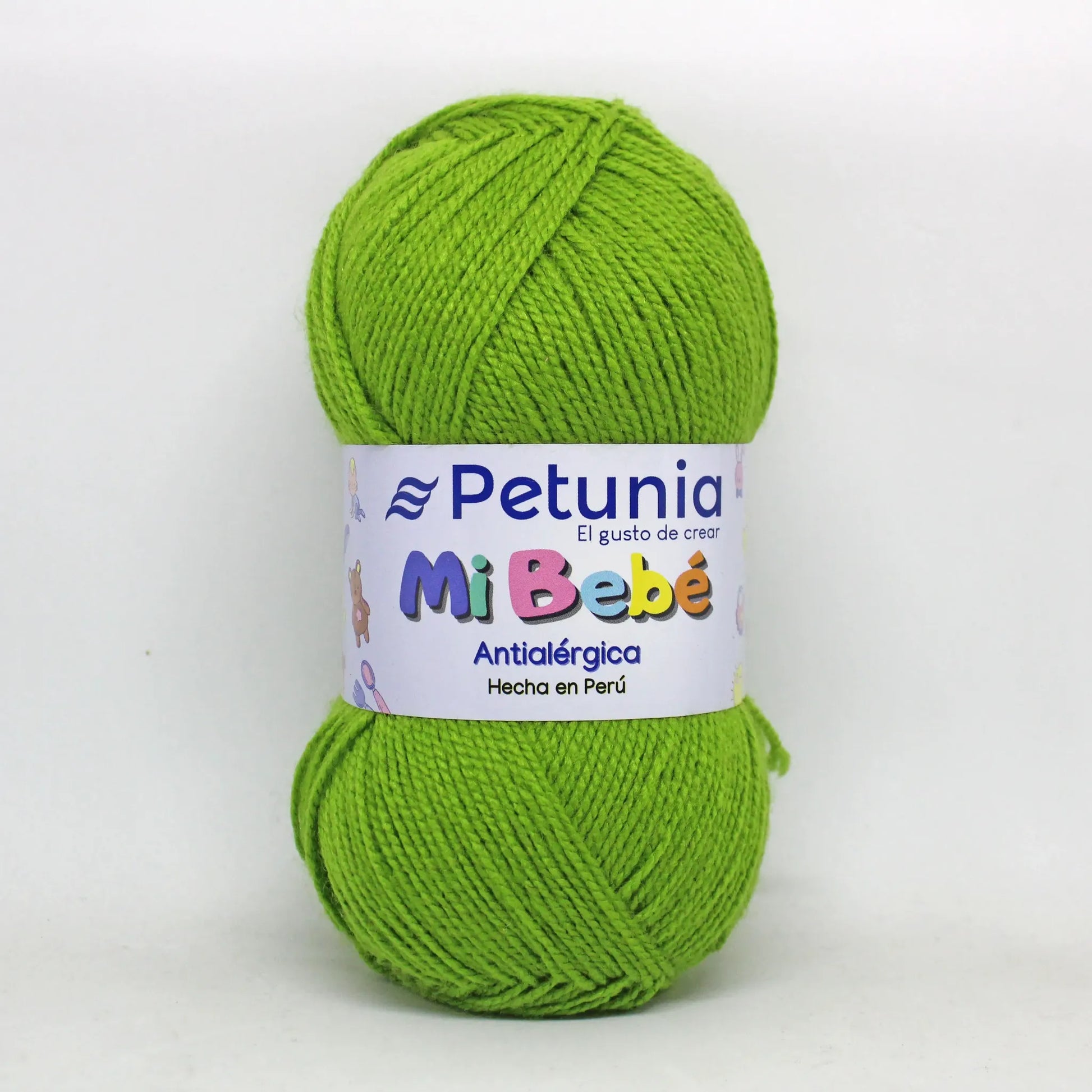 Ovillo de lana acrílica Petunia Mi Bebé color verde vibrante, suave y antialérgica, ideal para ropa de bebé.