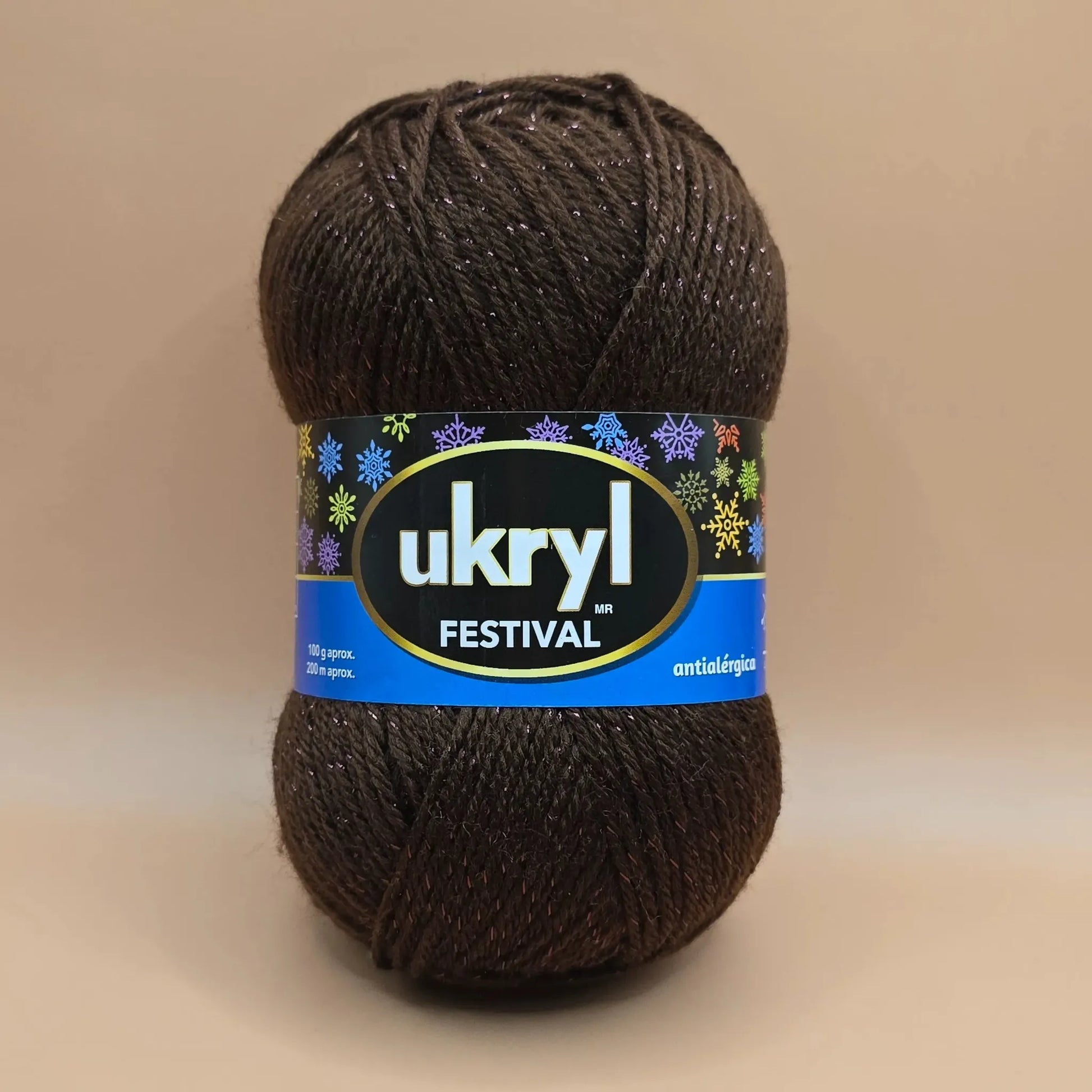 Ovillo de lana Ukryl Festival marrón oscuro con hilos brillantes, 94% acrílico y 6% lurex, antialérgico, 100g.