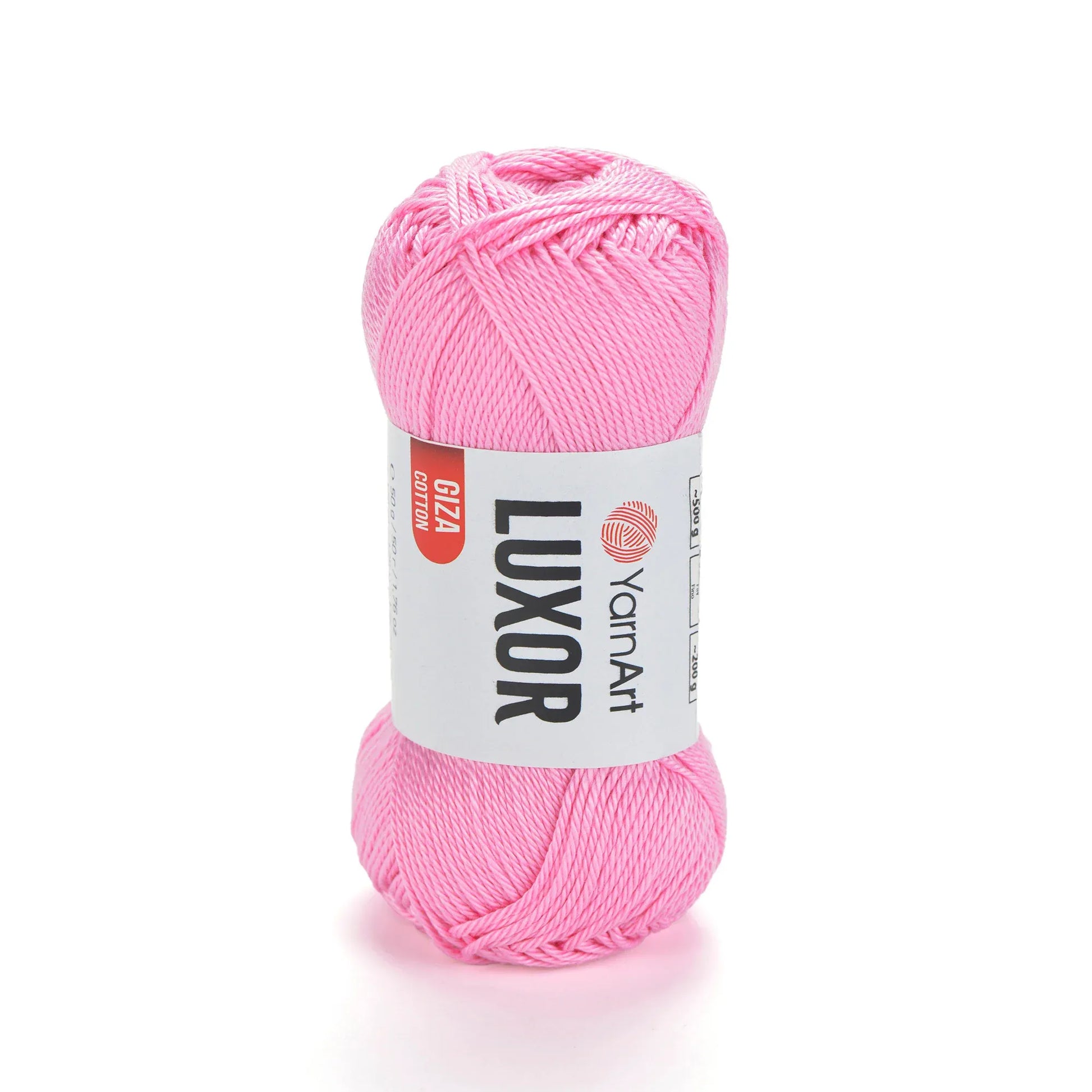 Ovillo de hilo YarnArt Luxor 100% algodón mercerizado color rosa vibrante sobre fondo blanco. Ideal para tejido y crochet.