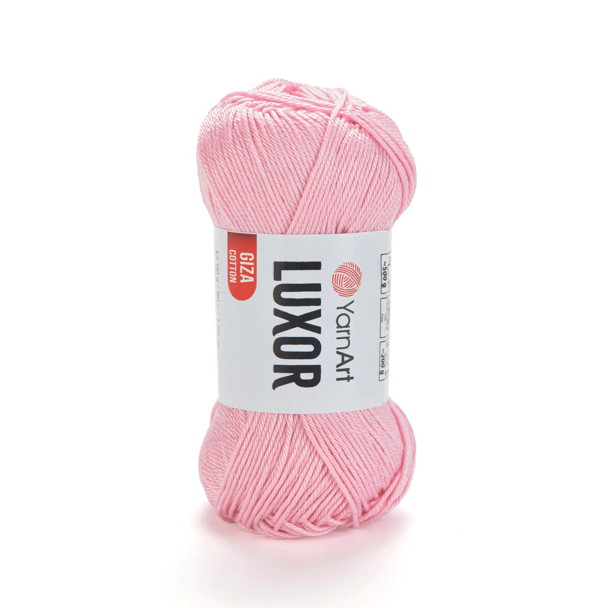 Ovillo de hilo YarnArt Luxor Giza Cotton 100% algodón mercerizado color rosa claro sobre fondo blanco.