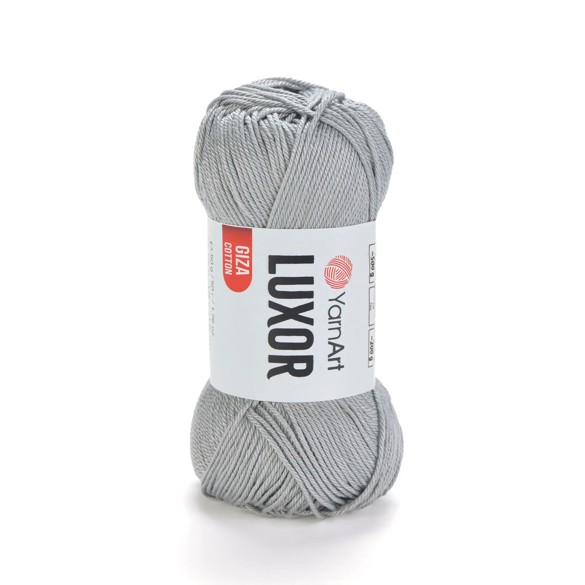 Ovillo de hilo YarnArt Luxor, 100% algodón mercerizado, color gris plateado, perfecto para crochet y tejido, fondo blanco.