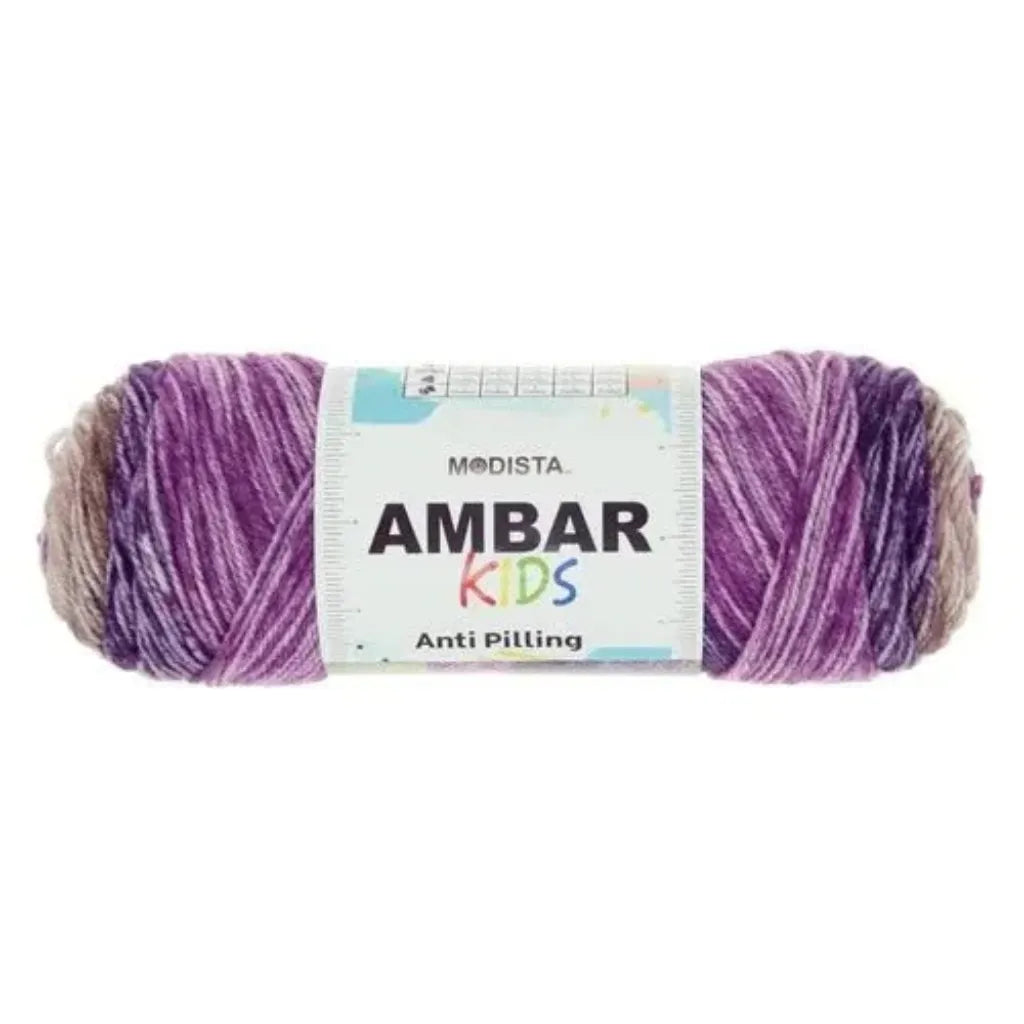 Ovillo de lana acrílica Modista Ambar Kids multicolor (tonos morados y beige), suave, con etiqueta anti-pilling.
