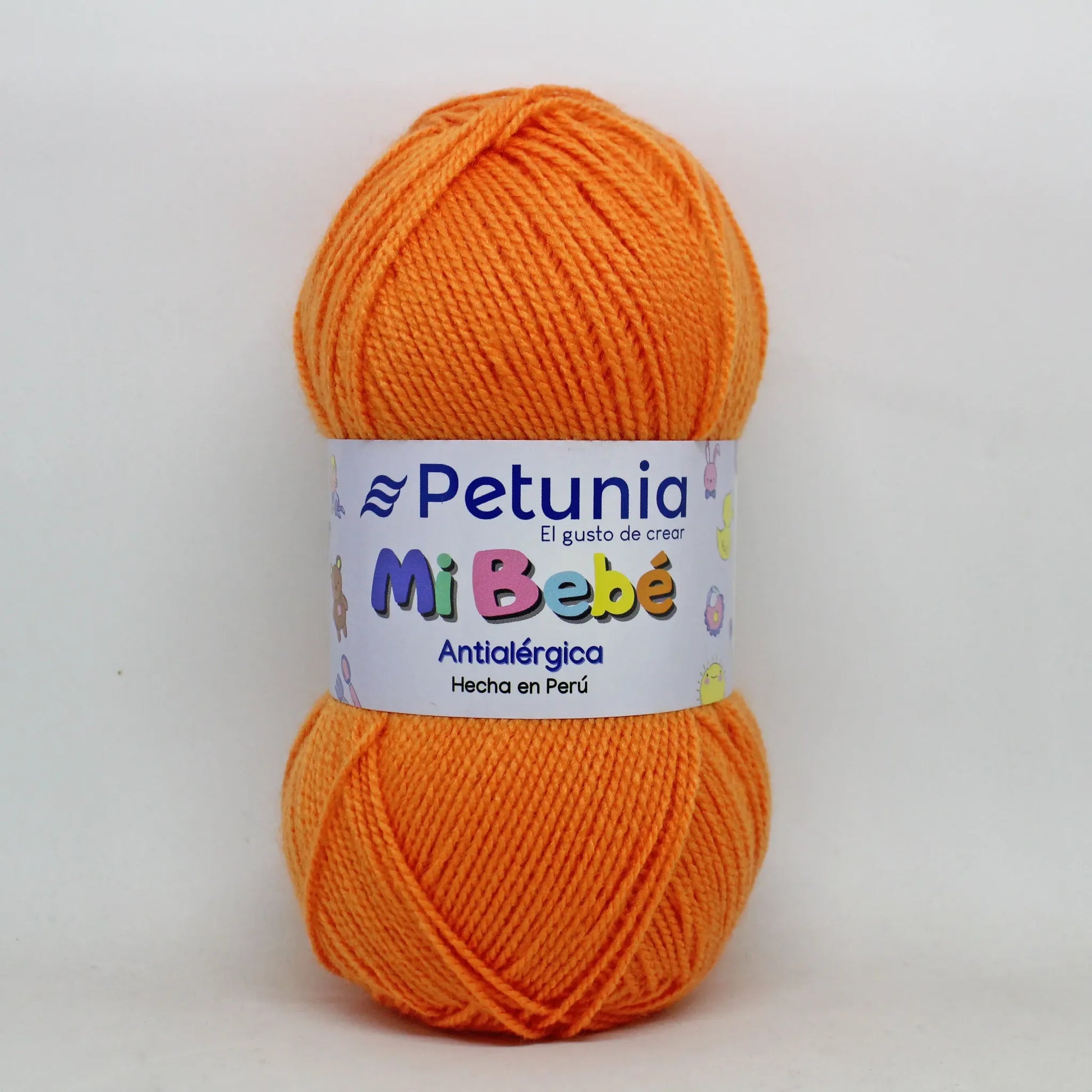 Ovillo de lana Petunia Mi Bebe naranja, 100% acrilico antialergico, suave, ideal para tejer prendas de bebe.