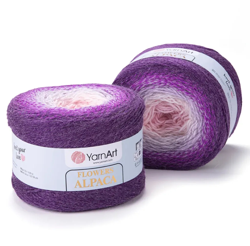 Dos ovillos de lana YarnArt Flowers Alpaca con degradado de color morado a rosado, mezcla de alpaca y acrílico, listos para tejer.